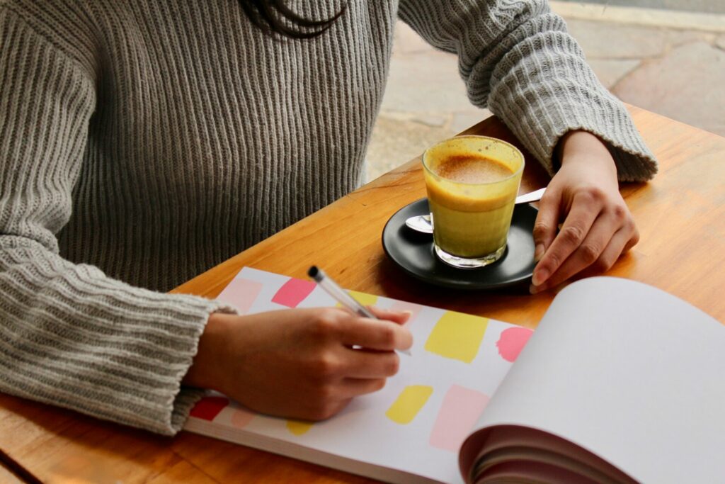 person working on a notebook